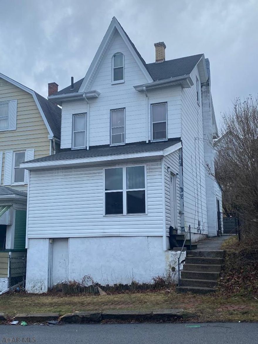 This spacious home with a large fenced yard and off-street parking that is close to major amenities such as shopping, the hospital, and only moments away from the interstate awaits your finishing touches.  The high efficiency furnace was recently replaced and new fencing was installed around the large yard.  There is off street parking as well.  Contact the listing agent for your private showing today.  Listed below the assessed value this property represents a great value opportunity.