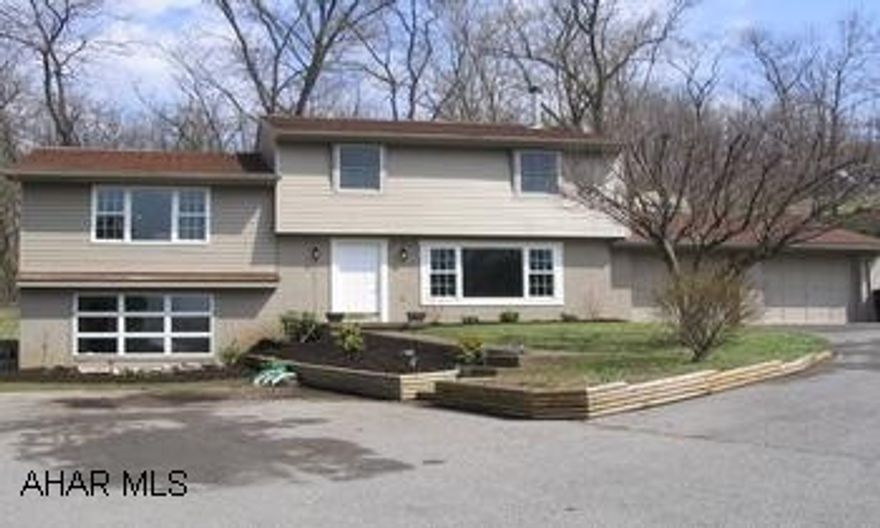 SELLER WILL CONSIDER HOME WARRANTY. LIKE NEW WITH HARDWOODS & CERAMICS. COULD OFFER FOURTH BEDROOM. BEAUTIFUL SUNROOM ADDITION. SCENIC SETTING. NEW SUNROOM ADDITION, NEW SIDING, NEW CARPET AND NEW BATHROOM.  EXTERIOR FRESHLY LANDSCAPED WITH BEAUTIFUL POND.