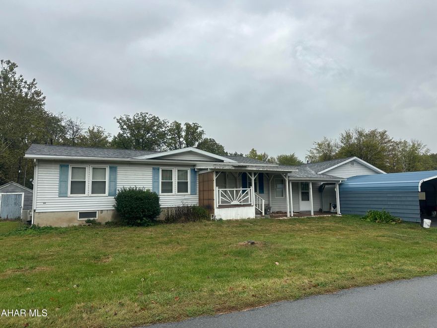 Doublewide with crawl space in Bellwood Antis school district, 2 bedrooms, 2 full baths, roof new in 2018, newer washer and carpet in the bedroom, family room and bonus room, attached oversized two car garage, paved driveway, carport to front of garage