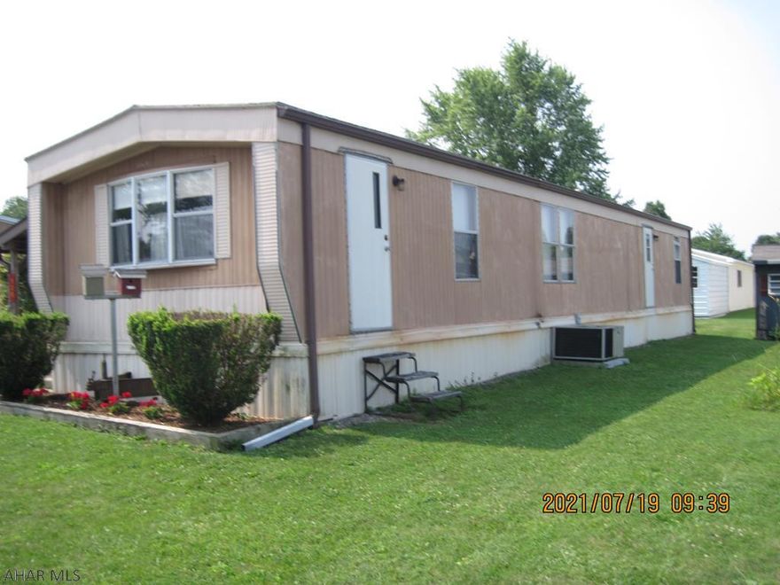 This Mobile Home features include, Kitchen, Dining Room with Built In Cabinet, Living Room, Two Bedrooms and a Full Bath. Central Air, New Furnace, New Fuel Tank. Shed. Located in Martinsburg Priced Right in a Nice Mobile Home Community. Must apply and be approved to The Mobile Home Park and allows a Dog 25 Lbs. or less. Must show proof of income and pass a credit check. Included in lot rent is the community dumpsters. Come take a look this just might be your home.