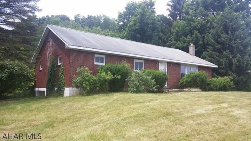 Solid brick ranch on half acre. Much potential. CASH only or Rehab loan a possibility.