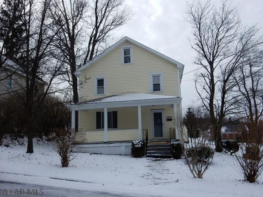 Nice home for your family--4 bedroom, 1 bath home on a corner lot, detached 1 car garage with remote. This home also has a large attic.