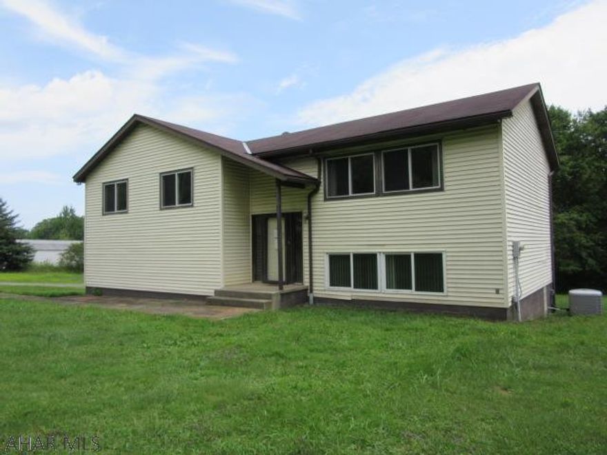 Woodland area- 3.43 acres with newer bi-level, some tlc would make this the perfect home, This property may qualify for Seller Financing (Vendee)