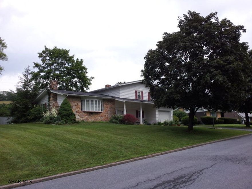 Good 2 bedroom split-level home in very nice neighborhood near high school and hospital. 1 1/2 baths. 2 fireplaces. Hardwood floors. Partially finished basement. Finished rear porch with hot tub. Pool is 1 year old. 1 car garage. Seller is licensed Real Estate Broker.