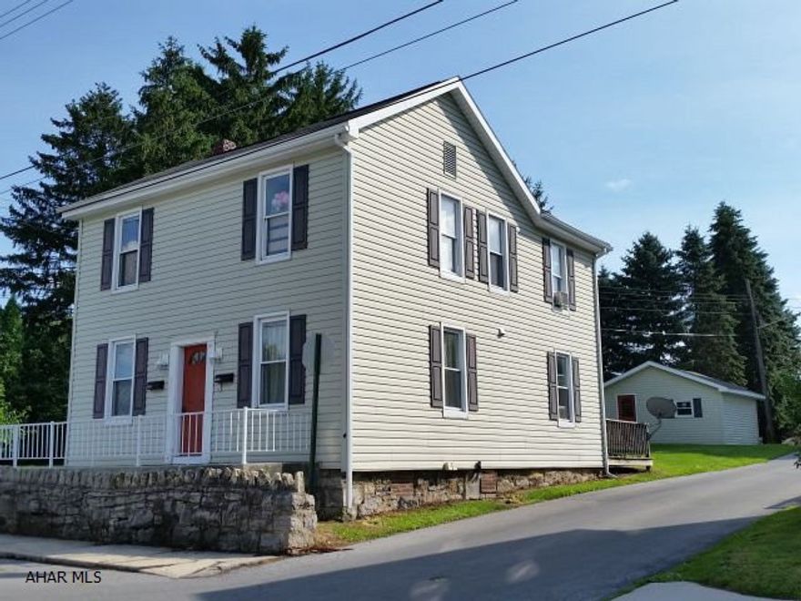 Great duplex with remodeled kitchens and baths. Nice deck and balcony. Off-street parking and 2-car garage. (Eash unit rents for $500/mo - seller pays water and sewer approx $84/mo total for both. Tenants pay own heat and electric).(2 Car garage rents for $150/mo). Good investment opportunity.  J-295