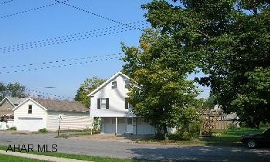Unique "loft" home in Hollidaysburg borough on lovely, large, corner lot in fabulous neighborhood! Potential galore!