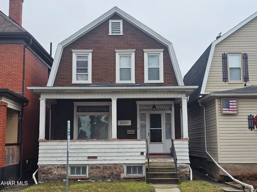 Nice two story home with a flat yard and off street parking.  This home features 3 bedrooms and a full bath on the second floor.  Main level features a large kitchen, dining and living room and a half bath.