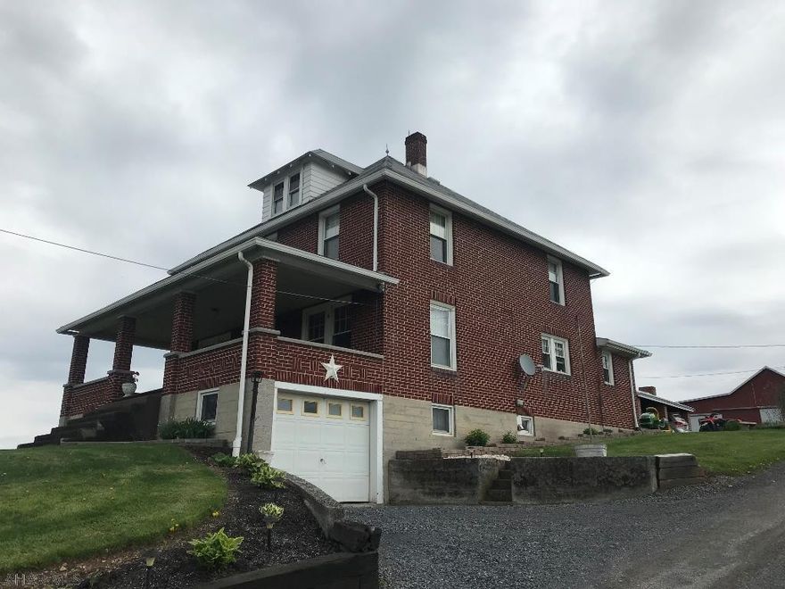 Expansive dairy farm w/ prime farming soil acreage. Soil resource report available! Farm buildings include: two story 4 bedroom 2 full bath brick residence, 3,000 sq.ft. milking center, 7,000 sq.ft. free stall barn, bank barn, dry cow barn, calf/heifer barn, machine shed/shop, second machine shed, storage sheds, commodity shed, pavilion, manure pit, and four silos. Nearly 180 acres of pasture and tillable soils with less than 15 acres of wooded land! Between the free stalls and the bank barn there are 120 stalls for livestock. Milking center is complete w/ milking parlor, holding area and milk house. Convenient location in west providence township with gorgeous mountain views. Farm has essential road frontage and easy access for vehicles and equipment.