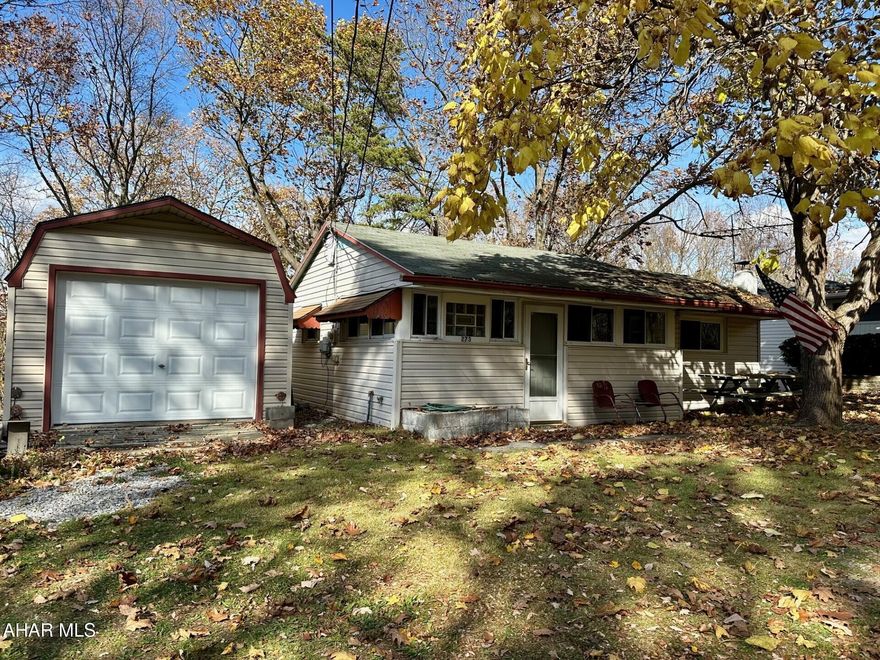 If you are looking for a weekend getaway, hunting retreat or a full time residence this is the one for you!!  Quaint and cozy 2 bedroom 1 bath and easy to maintain. Walking just across the road to 12,000 acres of Shawnee State Park that offers all your recreational needs, swimming, biking and walking trails, kayaking, fishing and much more!! 1 car garage for your vehicle or additional storage and a  tool shed. Abundance of wildlife!!  Move in Ready!