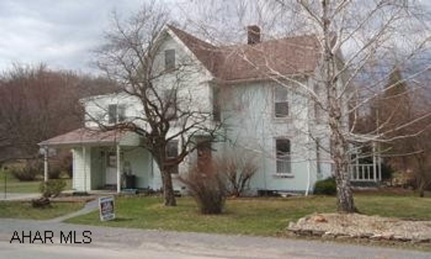 Large 2.5 story has out-of-town setting, yet convenient to in-town & on 0.6 acres. Many updates, 1st fl. BA & laundry, finished attic w/BR & bonus room. Flood insurance $265/year. Price below appraised value. This large, wonderful 2.5 story home has an out-of-town setting, yet convenient to in-town & is on 0.6 acres. Many amenities, updates & improvements, 1st floor bath & laundry, finished attic w/bedroom & bonus room. Flood insurance is $265/year. List price below appraised value.