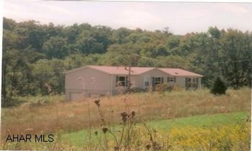 Doublewide on full foundation. Plumbing will not hold pressure. House is clean and in move-in condition. CALL FOR ADDENDUM