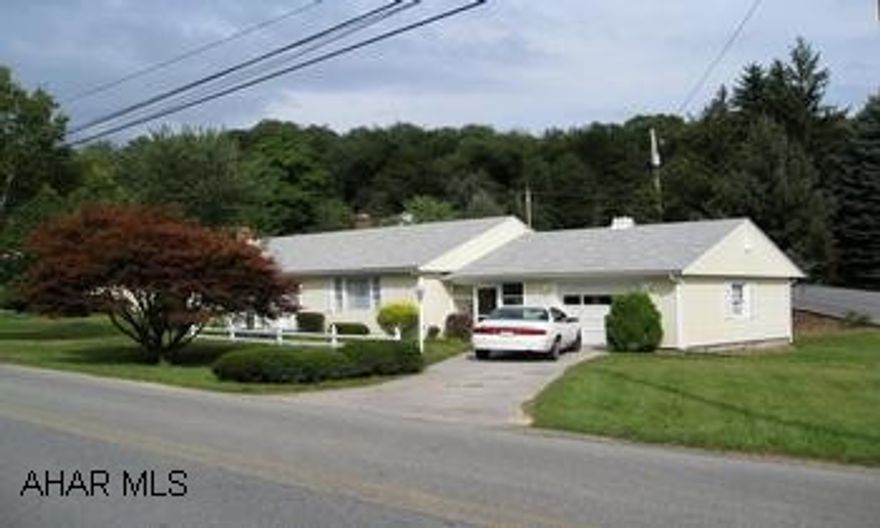 Well maintained rancher just outside Bedford Borough. Eat-in kitchen and new carpeting lend comfort to this home. Corner lot, near schools-shops. Space for expansion, private drive. Gracious living room, hardwood flooring under carpet, 3 bedrooms. Partially finished basement with wood burner.