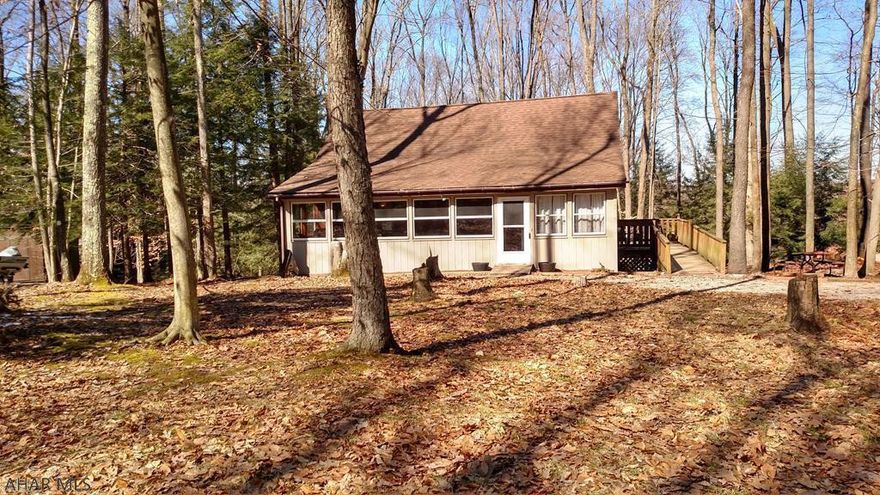Don't delay scheduling an appt. to tour this nicely renovated cottage about 1/4 mile past the entrance gate to Glendale Yearound.  Across the street are 782 acres of State Game lands.  There are no HOA fees.  If the new owners want to utilize the facilities at Glendale Yearound, they can pay about $510/year for that privilege.  Features include:  new engineered vinyl plank floors on entire 1st floor (2017), new laminate flooring on the 2nd floor (2015), new kitchen cabinets (2017), new appliances (2016), remodeled bathroom (2017), new ceiling & walls in the kitchen and bathroom (2017), new recessed lighting (2017), a freshly painted exterior (2017), and handicapped accessible.  Everything is on the 1st floor except for the loft. You'll love the layout, colors, & decorating. Priced to sell.