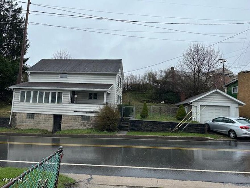 Nice 2 BR 1 BA home with one car garage. Home has been updated ready for you to move in.  Pellet stove in the living room. Full basement.