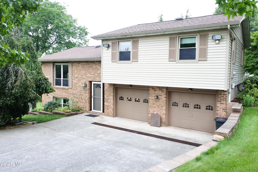 Move Right in! Very well maintained and updated home on almost a half acre in Logan Township. 3 bedrooms, 2.5 bathrooms....all tastefully remodeled with high end fixtures. The kitchen has also been redone with tile floor, backsplash and Granite Counter Tops....appliances stay!!  Adding to the list are new hardwood floors, Hunter Douglas blinds in the bedrooms and Dining Room.  Downstairs you'll be pleased with the Family Room....TV and Surround Sound stay....there is a French Door opening to a patio.  Mechanics are another bonus....zoned gas hot water heat plus a Heat Pump.  Enjoy Summer and Autumn evenings on the covered deck....watch the birds and butterflies attracted to the Perennials. Also staying are 2 sheds....1 has heat and A/C! Top it off with a new roof and you have a perfect place to call home.   There is a list available detailing updates and improvements.