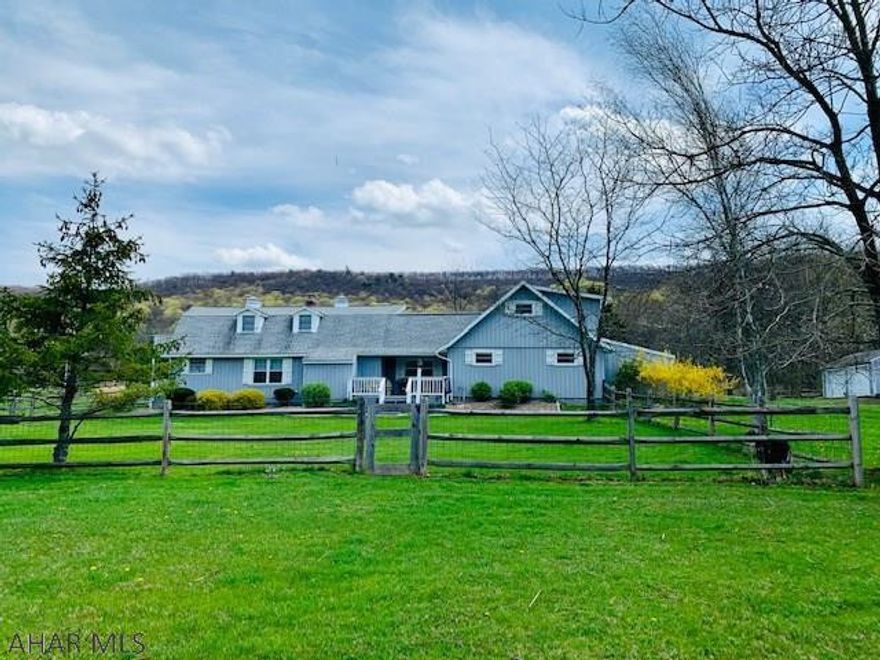 This beautifully renovated Dutch Colonial home offers you a private retreat or a residence w/pond and geese, rolling hills, meadows and plenty of wildlife! Open kitchen, dining and living room area with a newer added MF. master suite/bath and your very private deck that overlooks the pond! Laundry and mudroom is centrally located with easy access and convenience. The upstairs bedroom has its own private balcony a huge walk-in closet offering plenty of storage. Private bathroom offers double sinks. There are 2 garage stalls, above additional bonus room with heat and AC. Detached 2 car garage and 14x16 shed. Goat house with or without goats pet friendly with fencing. Included is a house generator, 4 new AC/heating system installed.