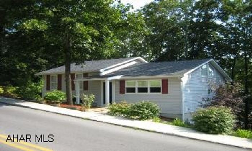 Vaulted ceilings in living room with brick fireplace opening to  nice kitchen. Finished family room with another brick fireplace. 1 car garage with large side yard. Toilet in laundry room .24th street to to 12th ave, make R, left on 23rd street.  Property is located on 23rd street.  Call J.P. at 695-4463 ext.215