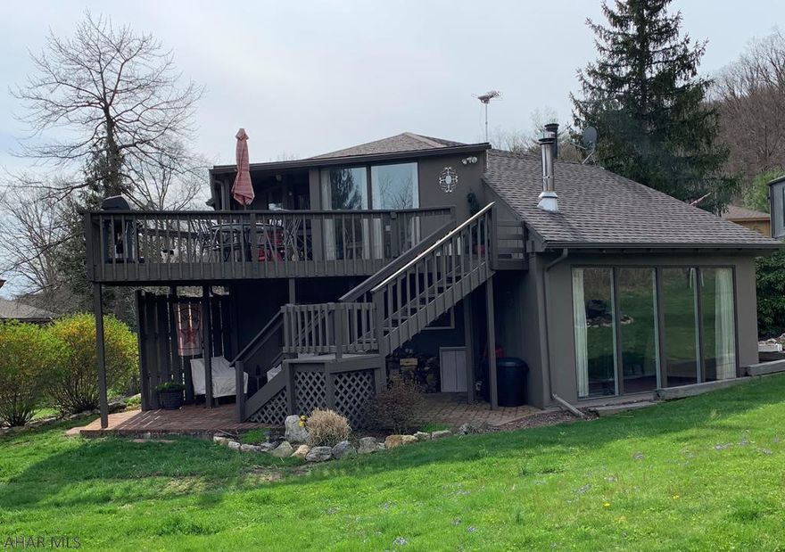 Enjoy the views of the Omni Bedford Springs golf course from your private deck and oversized yard with fire pit that is great for entertaining.  Entering the cul de sac you will find a spacious 3 bedroom, 3 bath home with lower level family room.  This home has many updates including a new roof, heat pump, water heater, exterior painting, spouting/gutter and storage shed.  Endless possibilities and a rare find make this a must see home.  This property won't last...call now for a showing!