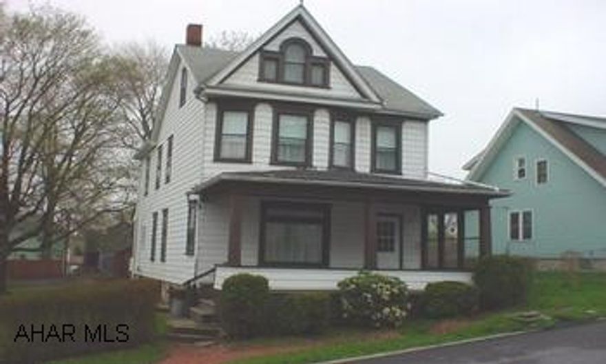 Spacious 3 bedroom, 1 bath home on double lot. Features large living room, formal dining room, lovely eat-in kitchen, and 1st floor laundry.