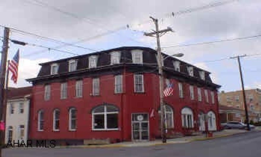 3 story brick with 3 apartments and 3 commercial or professional spaces. SOLD AS IS. Some deed restrictions apply. Cannot be used as financial institution, must be properly maintained. $500 bonus if acceptable offer is received before July 20, 2005.