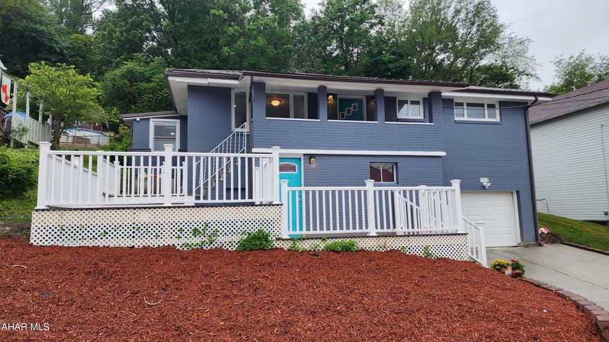 Completed renovated home in the Brownstown area of Johnstown. New Metal roof, New multi-level composite deck, new driveway, New appliances, new bathrooms, new new new! 4 bedrooms with potential for a 5th, 2 full bath, 1 car garage (new garage door) and lots of additional parking. Refinished original hardwood floors throughout, and lots of ceramic tile. The finished basement is very welcoming for guests (''mother-in-law suite'') with a bedroom and 3/4 bath... plus, an additional  recreation area. Enjoy the view of the city from the backyard! Entertain on the back patio, too! There are so many possibilities here. Schedule your tour today!