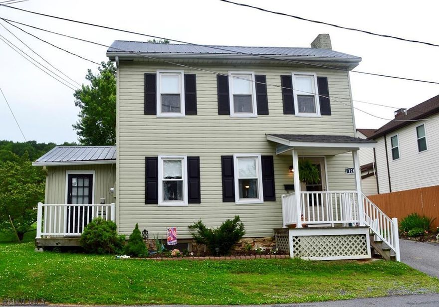 Located just 2 blocks from the square in Historic Downtown Bedford, this 2 bedroom 2 bath home is perfect for the first time home buyer. Updated throughout and kitchen appliances are included.  Central AC, back patio, large back yard and off street parking.  An absolute steal with super LOW taxes at under $300/year.  USDA, FHA, VA ELIGIBLE!  Call to setup your showing today!