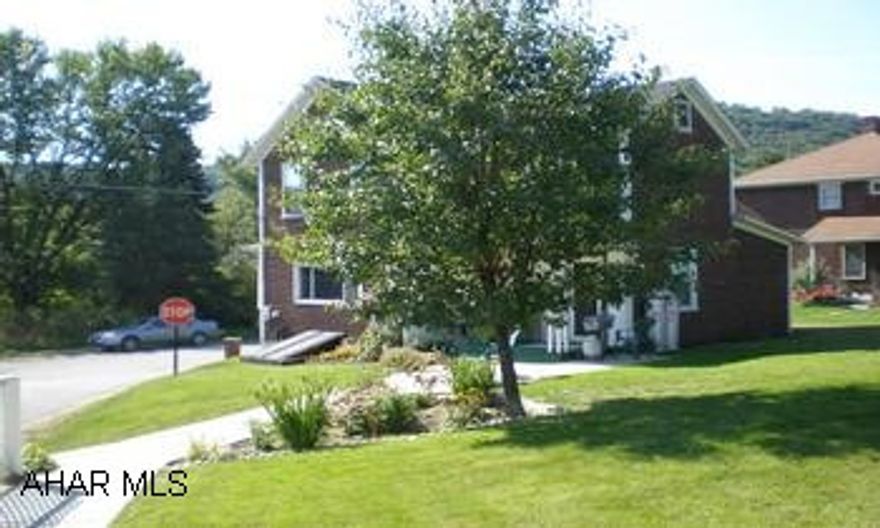 Two story home with professionally remodeled interior. Nice lot and location.  Corner of Ash and Old Miller Road.