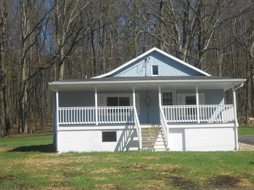This home has had a complete facelift inside and out! Newly graded and seeded yard, paved drive, new porch steps and carpet, and side walk! Inside is a cozy haven to call home. Mudroom and laundry room, eat in kitchen with newer appliances. All new flooring and all rooms painted. Move-in ready!