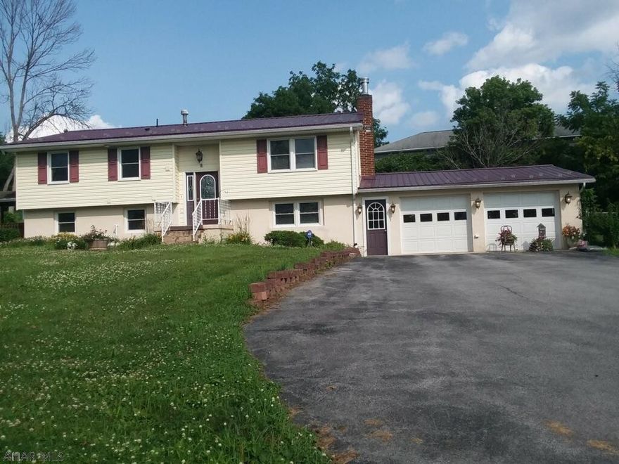 This unique property has a lot to offer.  There is a handicap accessible bath . the lower level of house could be 4th bedroom and family room with kitchenette area or a Mother in Law suite or a rental. There is an attached 2 car garage plus a large detached 2 car garage and there is a large pole barn with doors for RV storage, workshop or garage for a large tractor trailer. Area is private. So many possibilities.  Sellers will have carpets cleaned before closing or a carpet allowance.  Property has recently been subdivided .The taxes are estimated new taxes.  The property lines are marked well, the road is a private road after making the left from 1st Street.