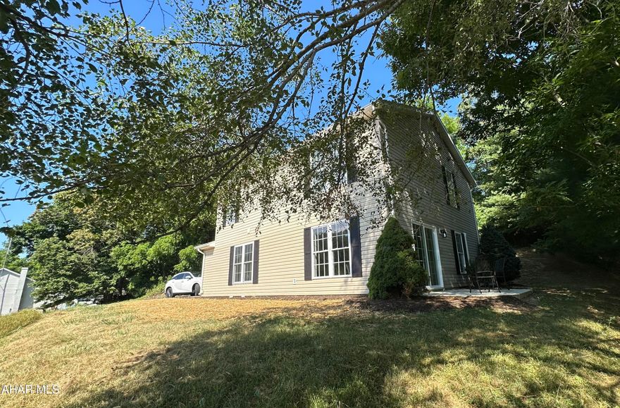 Wow ........ seriously this is a gorgeous home!  The minute you walk in this beautifully renovated home, the attention to detail is stunning!  This is a move in ready home!  

One can feel the joy of relaxing in the spacious and inviting open concept living, dining and kitchen areas.  The home's designer feel  s enhanced by large and inviting windows that warm living spaces with plenty of natural lighting while taking in lovely views.   The fabulous new kitchen has lots of storage and countertops allowing for great food preparation and entertaining.  Enjoy the ease of dish cleaning and food prep with the oversized sink with designer faucet.  Step out to a private patio from the dining room French doors.  Also, found on the first floor is a 1/2 bath and direct access to the attached garage.

The upper floor will not disappoint with its large owners suite which consist of walk in closet and private bath.  Two additional spacious bedrooms share another bathroom.  The laundry room is conveniently located on the second floor.  Like the first floor, views are terrific.

The home comes complete with updated wiring, whole house air purification system and the energy efficiency of this home cannot be overstated. 

So what's new..... the entire first floor was rebuilt and redesigned including wiring, flooring, walls, doors, most windows, most of the siding, kitchen, bathroom, recessed lighting, plumbing and painting.  The second floor, new walls were added to make three bedrooms plus new bathroom fixtures and hardware, new ceiling fans and the addition of a second floor laundry area plus painting.

This is a must see home that will not last long!