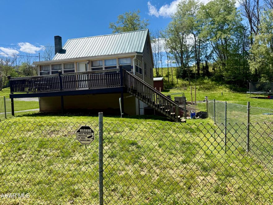 Looking for a cozy getaway or a full-time residence? Check out this home in the little community of Locust Beach (Northern Bedford SD). sitting on .424 acres, On the main floor you will find a bedroom, a full Bath, living room and a recently updated Kitchen.  The upstairs offers a versatile space that could be extra sleeping area, office, etc.  Stunning natural wood throughout the home. Full basement. Easy access to river frontage at Locust Beach. Great for fishing, kayaking etc.