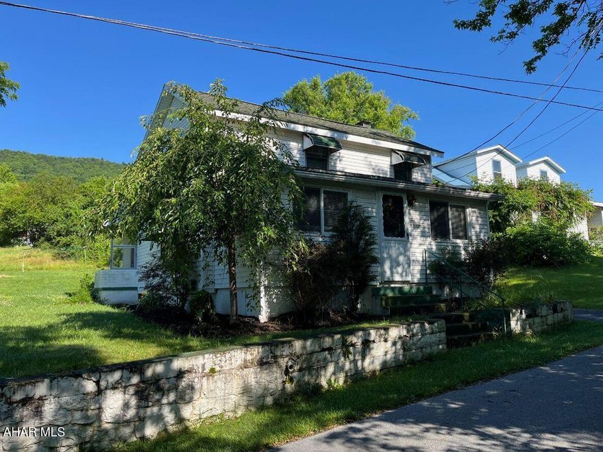 Remodeled 2 story home close to town. Newer kitchen with granite counters. Newer flooring throughout. Newer bathroom with tile shower. 1 bedroom upstairs with bonus area. First floor has a den that has the possibility to be a second bedroom. Large yard.  Detached garage. Move in ready!