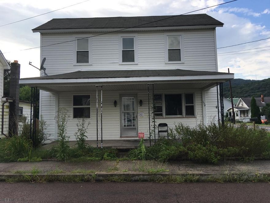 Bigger than it looks! This unprepossessing 2 sty house will surprise you. Although it needs work, the potential is there- hardwood & plank floors thru-out- eat in kitchen, living room, & family room downstairs- 3 bdrms upstairs. Large corner lot with level back yard- room to play, entertain & have a garden.