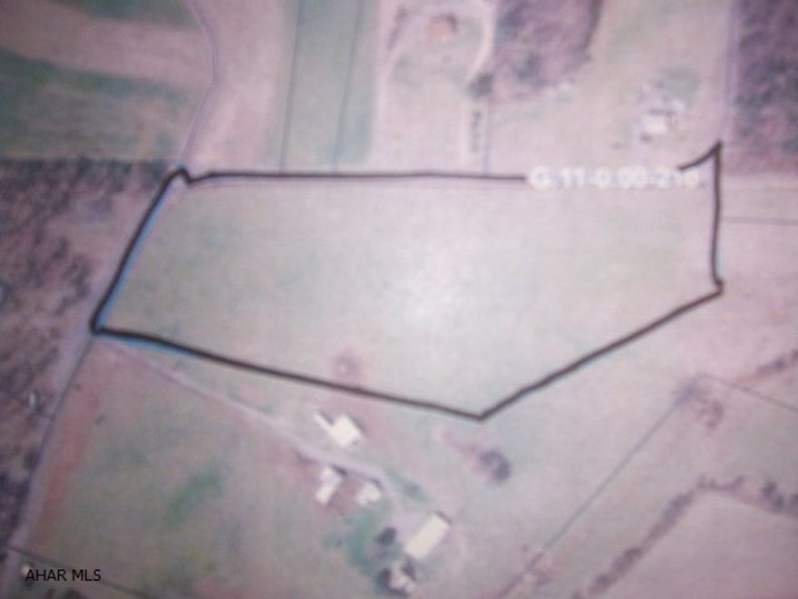 Beautiful picturesque views of the open meadows and mountains!! Make this breath taking building site for your New  Home!! Only 5 miles from Interstate 70, PA turnpike and Rt.30 Lincoln Hwy, and downtown Everett and Breezewood. Mineral rights convey with property!!  Electric Available.  Excluded is the electric fence and the feeder.