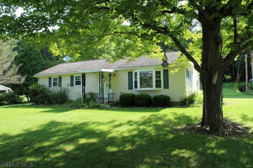 Move in ready, freshly painted and cleaned, 3 bedroom home on 0.67 ac. Spacious 2-car detached garage and partially finished walk out basement for extra storage. Hardwood floors and ceramic tile throughout the home. Fruit trees planted out back and a nice level front yard. Call today for a tour of this cheery home.