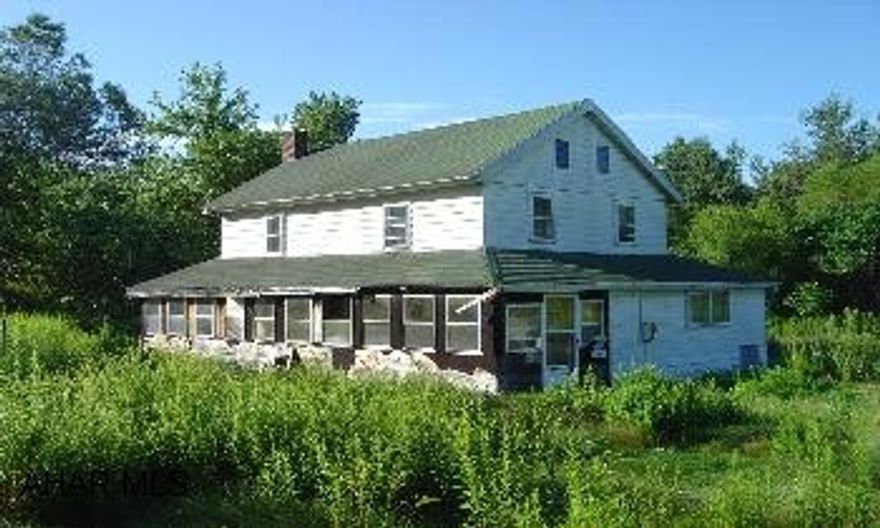 Old, 2 story home in need of work. 5.7 acres, borders trout stream, Large tracts of land nearby for hunting. State Game lands also nearby. House has been vacant for 4 years, no heat. Located about 1.5 miles from Irvona. Take Rt 53 from Coalport to Irvona, take the left fork in Irvona, go 1.5 miles +/-, directional sign on left near some houses, turn left on lane, go 500' to property. Gate opens by unwinding wire.