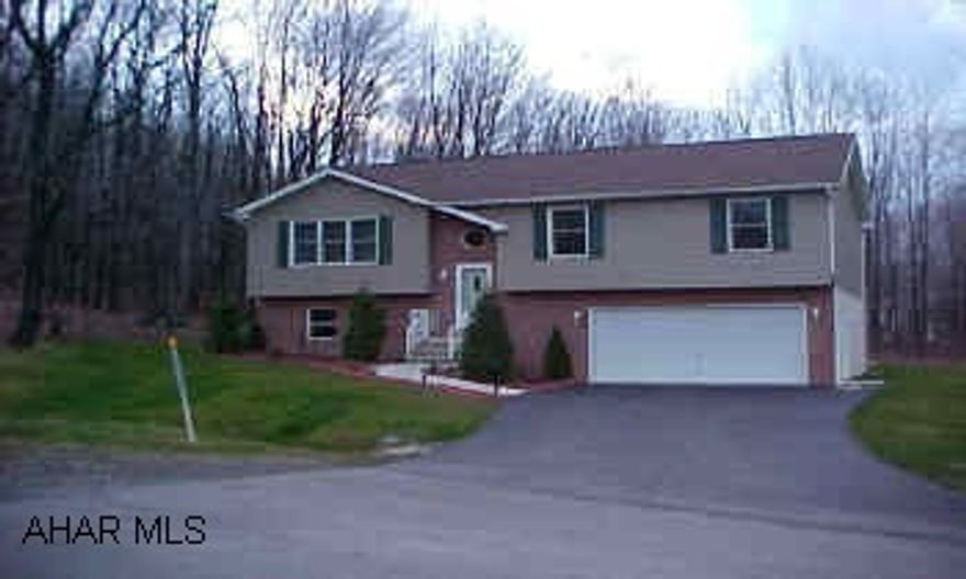 Beautiful spacious split entry like new condition-freshly painted move right in.  Nice lg. level lot - plus extra lot - not included. Property has a separately deeded lot which can be sold separately for $7500.