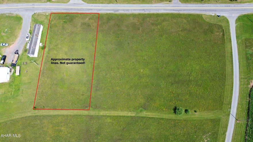 Nice building site in the country consisting of 0.46 acres with public sewer availability. Buyer is responsible for the sewer tap fee and confirming access.