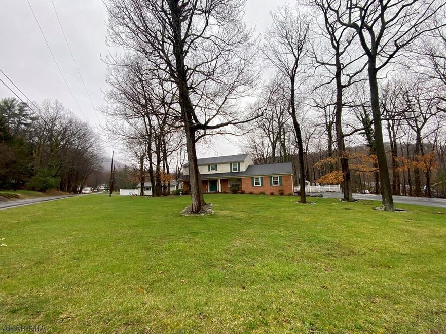 Located on a corner lot in the desirable Juniata Springs this 4 bedroom, 2.5 bath home has so much to offer.  The first floor features a large kitchen with eating area that has a full view of fenced in yard, and in ground pool.  The second floor features a large master with mater bath, wall closets, and changing room.  See additional documents for list of improvements.