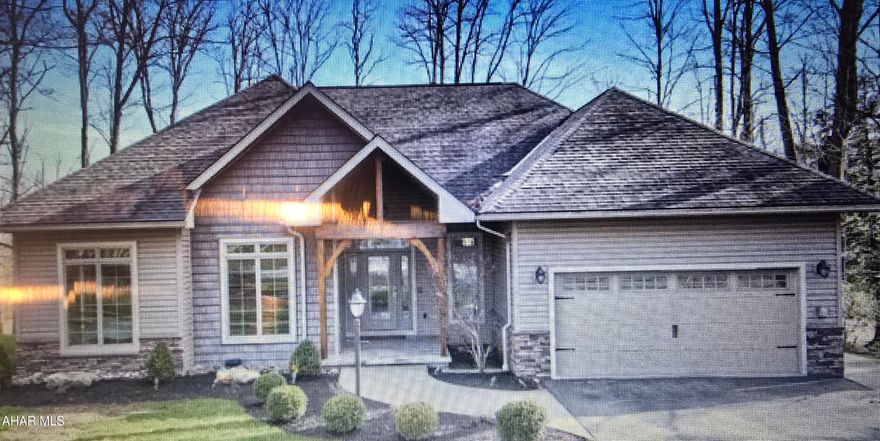 Impressive Ranch home with upgraded finishes speaks Luxury Living. The open main floor has 9' ceilings, accent ligting, large windows which set the stage for tranquility, modern living. This 2013 built home has large primary suite with additional bedrooms/office space and laundry on main floor. Huge family space, 2 bedrooms, office, spa bath in lower leve

Nat gas heat, AC and generator. Lower level has 2 ways for egress. The exceptional style and landscaping of this home make the curb appeal fantastic. Large yard with multiple level decking, tree house and impressive fenced yard add to the style. Must see home in nice Treasure Lake location close to Bimini boat launch and beach.