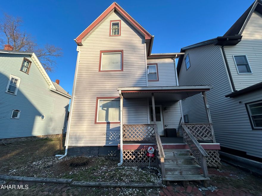 Easy access to shopping, restaurants, doctors, and hospital.  This home holds a lot of potential with beautiful wood work and possible hardwood floors under the carpet.  The walk up attic has potential for a third bedroom suite.  Laundry on the first floor off the kitchen.  The furnace was serviced on a yearly basis.