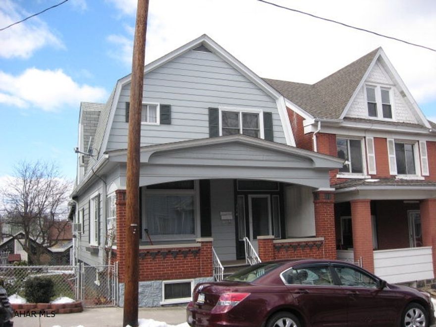 Charming, updated with loads of character.  Large rooms, sunroom, library, office, original woodwork.  Landscaped Double lot.  Large 2 car garage with storage.  New furnace, windows.  All appliances included.