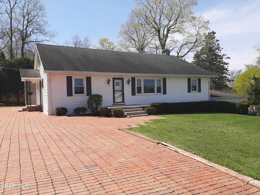 Nice home in Cresson Township! This home is bigger than it looks! This quality built home has a lot to offer from the stone walls in the garage, the hand layed brick driveways and walkways, to the beautiful corner lot within walking distance to the amenities that Cresson has to offer. Large rooms on the main level include: kitchen, dining, living,bonus, full bathroom and 2 bedrooms. The second level offers an additional living space for an apartment or business opportunity. This space includes room for a kitchen and dining area, living room, bedroom, laundry and bathroom. A walk out to a second floor covered deck. The full basement has the potential to be finished for additional living space. The basement walks out to the 2 car garage/carport. Also on the property is a 12x40 shed with electric, that can be used for any type of storage. This home has been very well loved. Call to see this one for yourself!