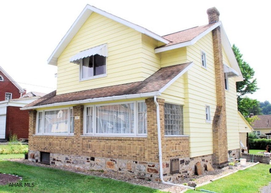 Very nice older home in move-in condition. Newer windows, newer berber carpeting, good roof.  New hot water heater in 2012. Cute three-season enclosed front porch with fresh paint and new laminate floor.  Professionally cleaned for the sale so you can move right in. One car garage and plenty of off street parking.  Location convenient to everything!!  HOME WARRANTY INCLUDED!