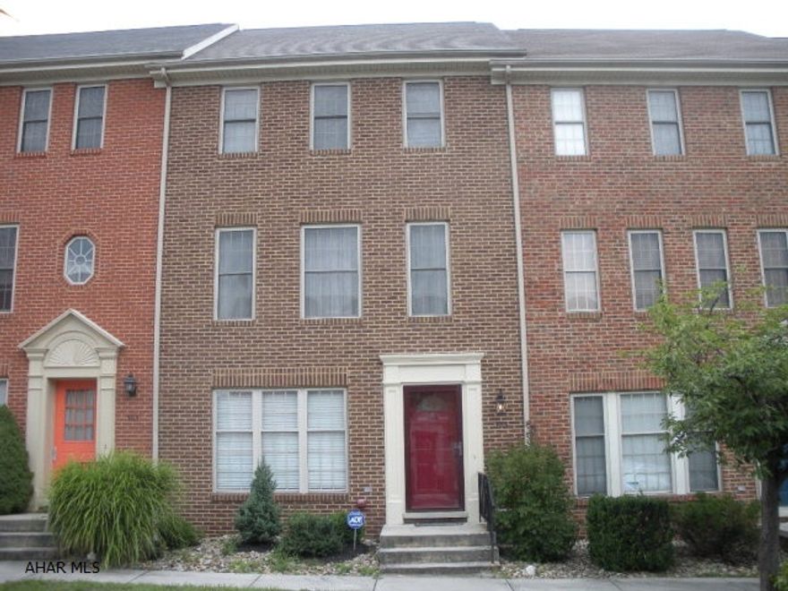 Nicely updated townhome in Sweet Cherry Court.  Newer laminate floors in main living space that is open to dining area and kitchen, updated stainless steel appliances, main floor 1/2 bath, newer rear deck and landscaped yard with off street parking.  The lower level has a family room and a laundry room and there is also a laundry chute from the bedroom level. Central AC, newer water heater and a security system. This is a move in ready home!