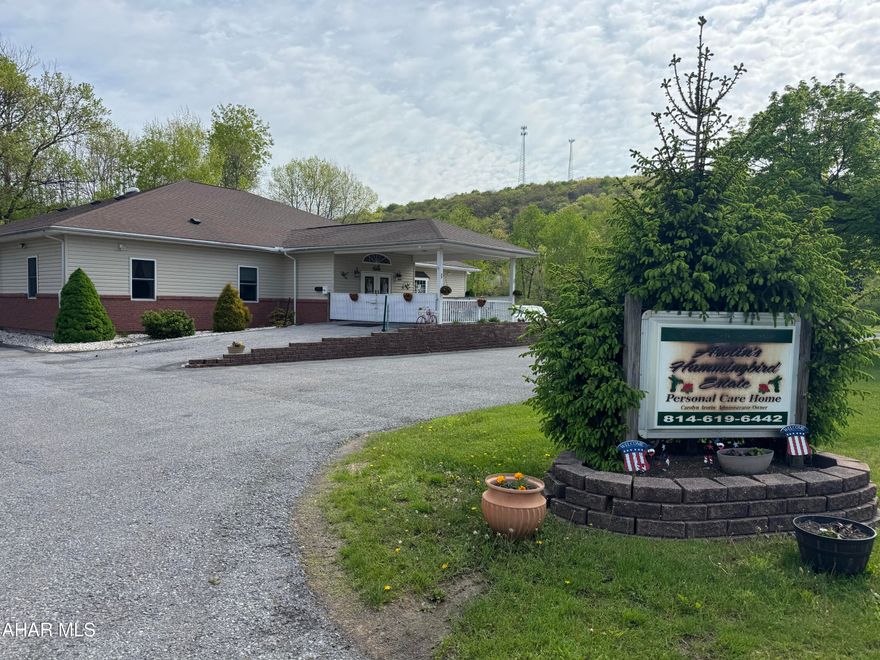 Brick and vinyl sided one story personal care (assisted living) home (built in 2001) on approx. 1.2 acres. Fully occupied and in operation and includes a two car garage with apartment above (built in 2007). The buildings are in great condition and of good quality.  Had up to 13 occupants.