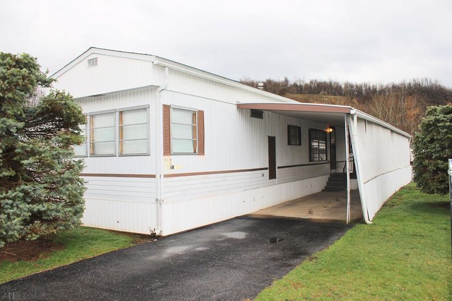 Well-maintained home in Eldorado Mobile Park, a 55+ Community! This home features 2 bedrooms, 1 full bath, and a spacious kitchen that opens to the living room. Outside, there is a shed and plenty of parking for two vehicles. Lot rent is approx $378 a month which includes water, sewer, snow & trash removal.