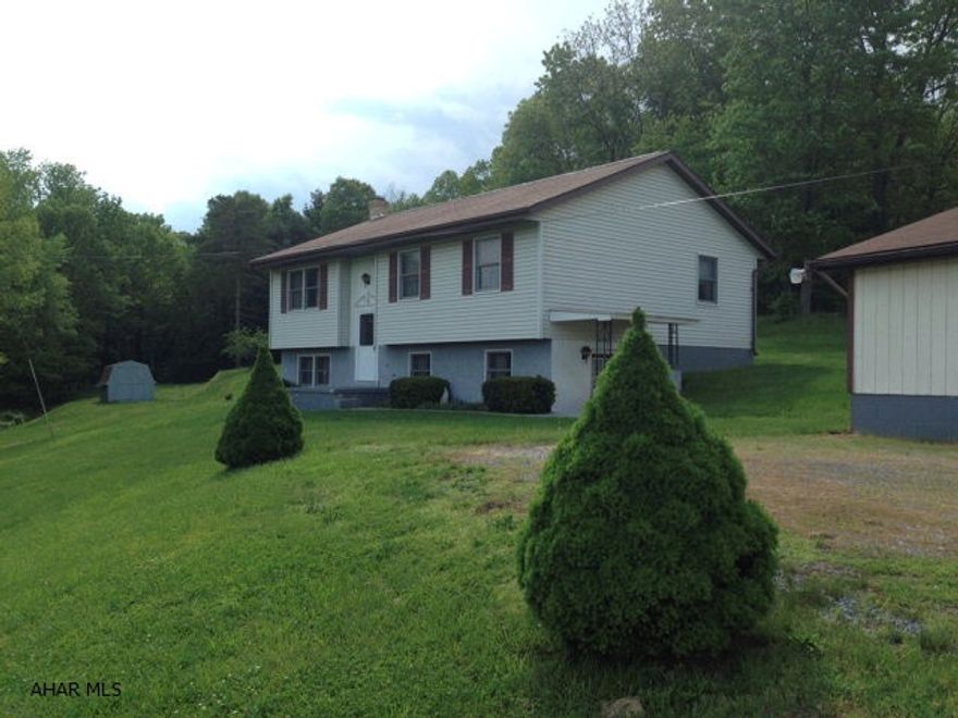 Lovely 3 bedroom, 2 full bath home on 3 private acres. Home has been beautifully maintained. A huge 2 car garage completes the home. Sliding glass doors off the kitchen offers a great place to relax and entertain guests. A great buy!