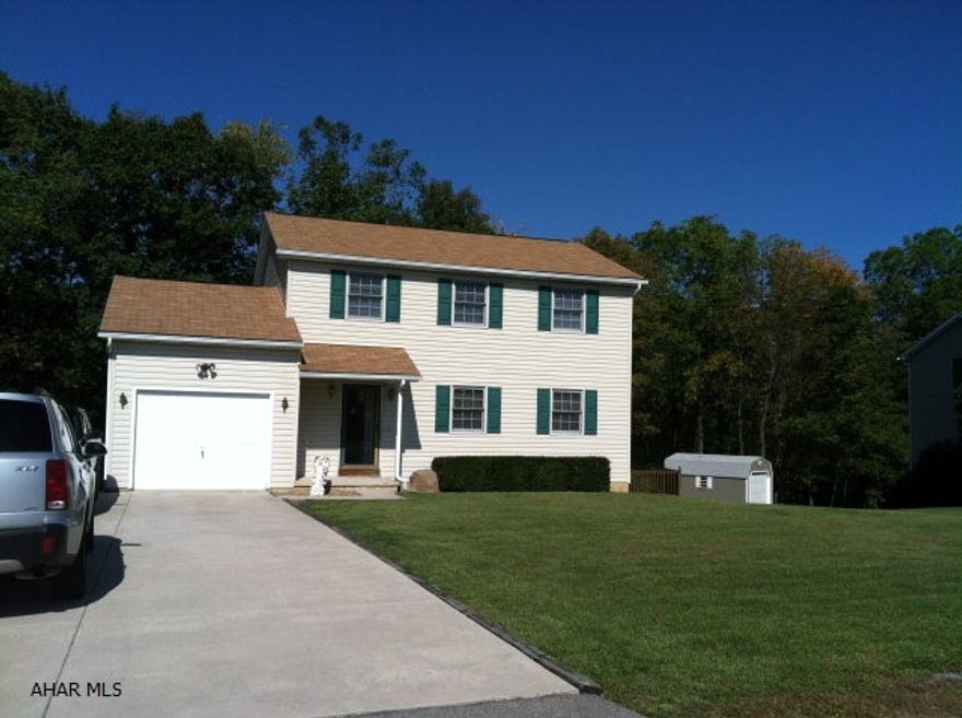 Move-in ready home in a great Greenwood neighborhood on a quiet cul-de-sac.  Features include 3 bedrooms and 1.5 baths, central air.  10x12 foot shed included.  Attached garage has work area.  Great outdoor entertaining on large deck that overlooks a wooded area.  Dining room currently used as a computer/office area.  SELLER WILL GIVE $2000 ALLOWANCE FOR CARPET REPLACEMENT AT CLOSING.