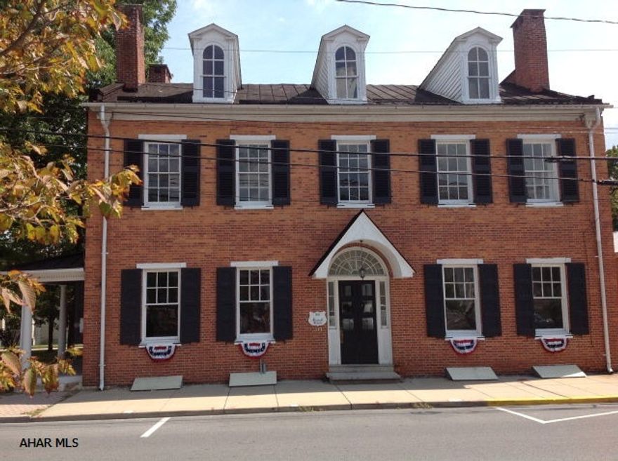 TheCirca 1816 Russell House is in the heart of historical downtown Bedford . It could be a fabulous single family home or a Fantastic location for many businesses including a restaurant of many choices. The wonderful covered porches could give ample outside dining at it's finest.